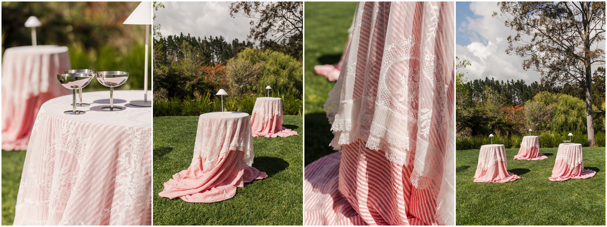 Red lace wedding tablecloth layered over striped linen on the lawn